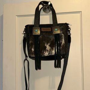 Brand new cowhide wrangler bag